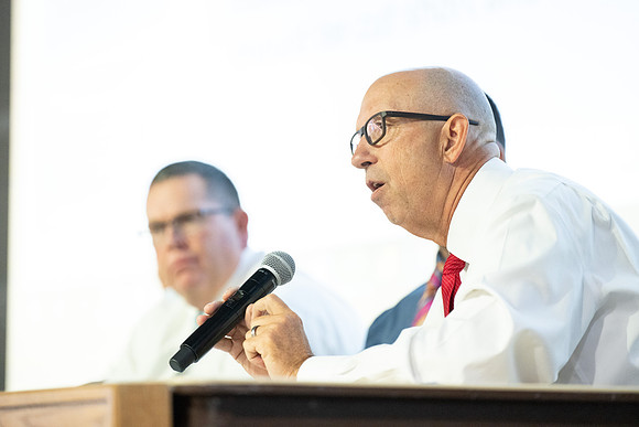 Faculty gather together for a Conference before the start of the Fall semester.