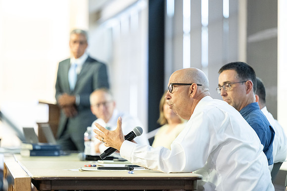 Faculty gather together for a Conference before the start of the Fall semester.