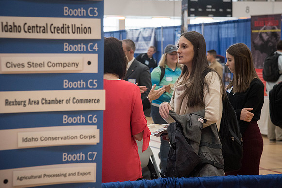 Booths fill the I-Center Courts where Businesses and Graduate Schools wait to meet with BYU-I students at the Career Fair.
