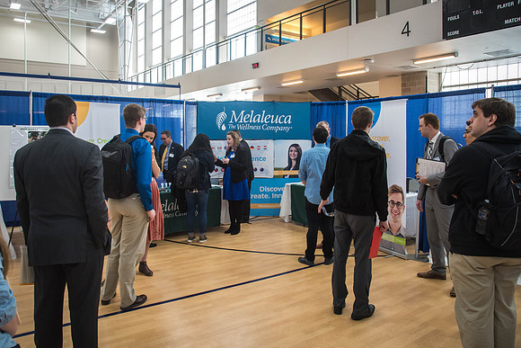 Booths fill the I-Center Courts where Businesses and Graduate Schools wait to meet with BYU-I students at the Career Fair.