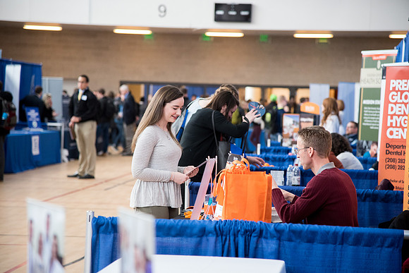 BYU-Idaho students attend the career fair. Students can find potential jobs and internships for their prospective majors at the fair.