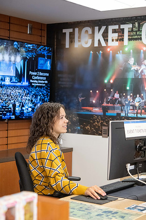 A student employee at the ticket office.
