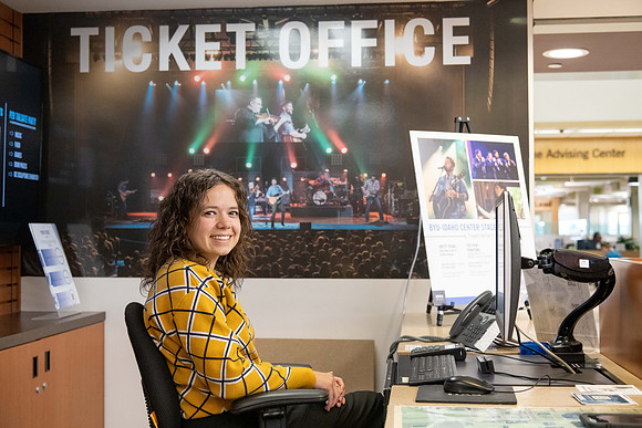 A student employee at the ticket office.