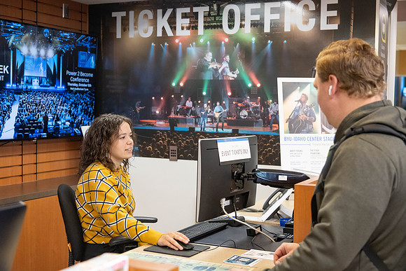 A student employee at the ticket office.