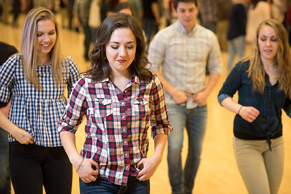 Students gather each week Manwaring Center Ballroom to country dance.