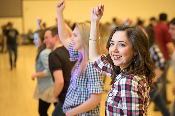 Students gather each week Manwaring Center Ballroom to country dance.