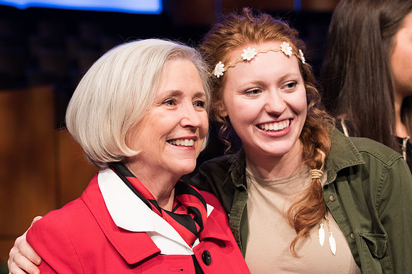 BYU-Idaho Devotional. Guest Speaker, Neill F. Marriott taking a picture with a student. Feb 2018