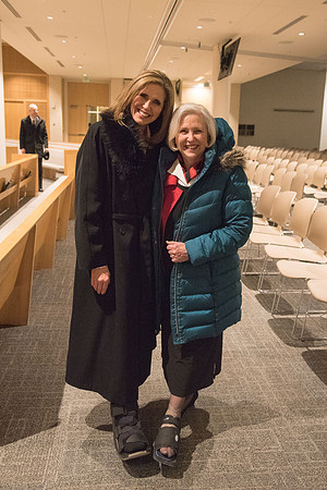 Sister Neill F. Marriott and Sister Eyring both have boot on their feet.