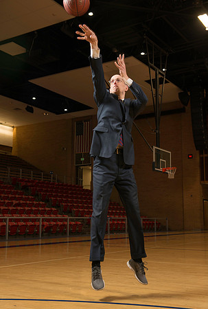 7'8" Superstar basketball player runs a 4.3sec 40, jumps 50" verticle and shoots 95% from the 3 point arc.