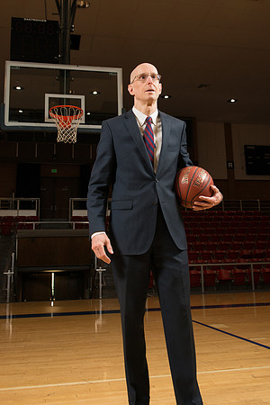 7'8" Superstar basketball player runs a 4.3sec 40, jumps 50" verticle and shoots 95% from the 3 point arc.