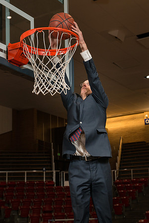 7'8" Superstar basketball player runs a 4.3sec 40, jumps 50" verticle and shoots 95% from the 3 point arc.