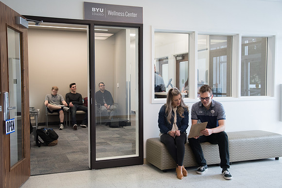 A BYU-Idaho Wellness Center student employee coaching other student to achieve their goals towards health and wellness. Feb 2018