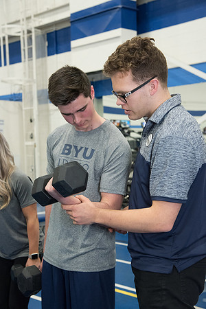 A BYU-Idaho Wellness Center student employee coaching other student to achieve their goals towards health and wellness. Feb 2018