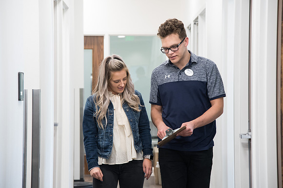 A BYU-Idaho Wellness Center student employee coaching other student to achieve their goals towards health and wellness. Feb 2018