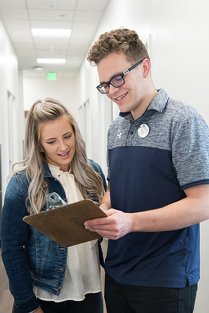 A BYU-Idaho Wellness Center student employee coaching other student to achieve their goals towards health and wellness. Feb 2018
