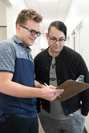 A BYU-Idaho Wellness Center student employee coaching other student to achieve their goals towards health and wellness. Feb 2018