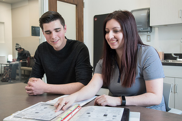 A BYU-Idaho Wellness Center student employee coaching other student to achieve their goals towards health and wellness. Feb 2018