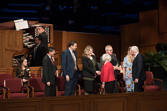 Sister Neill F. Marriott, Second Counselor in the Young Women General Presidency, enters the I-Center before her Devotional address.