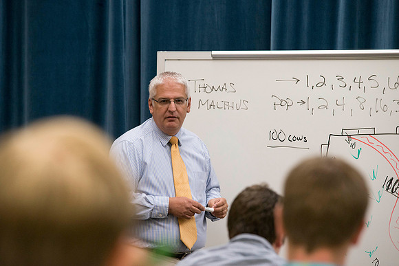 Brother Duane Adamson teaches his Political Science class in the Hinckley Building during the 2014 Spring Semester.