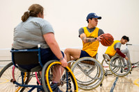 Students participate of Wheelchair Basketball in the Hart Gym.