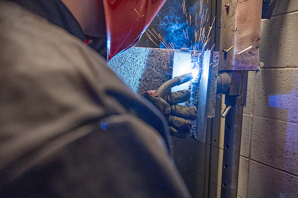 Students working in the welding lab.