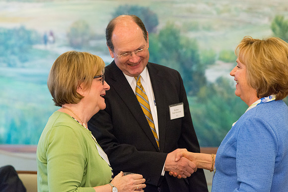 Guests have a chance to mingle during an evening with President Henry J. Eyring in the Church Office Building in Salt Lake City, Utah.