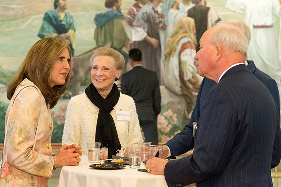Guests have a chance to mingle during an evening with President Henry J. Eyring in the Church Office Building in Salt Lake City, Utah.