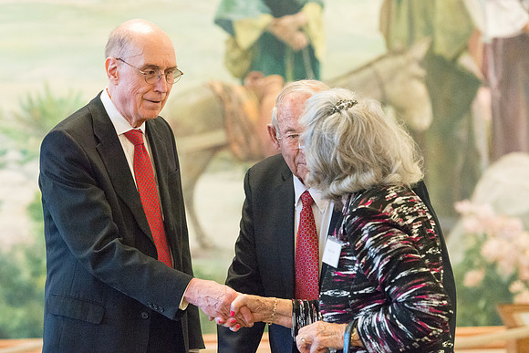 Guests have a chance to mingle during an evening with President Henry J. Eyring in the Church Office Building in Salt Lake City, Utah.