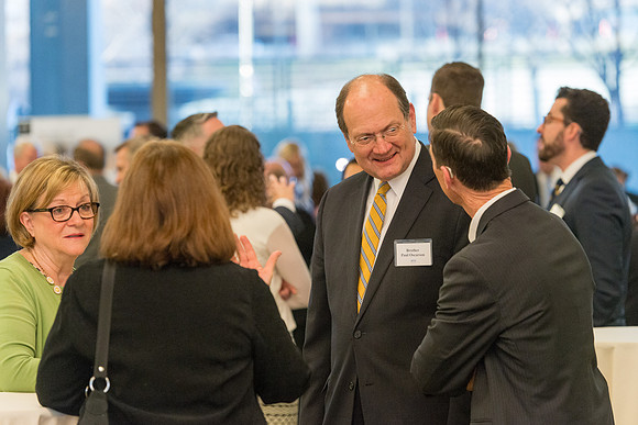 Guests have a chance to mingle during an evening with President Henry J. Eyring in the Church Office Building in Salt Lake City, Utah.