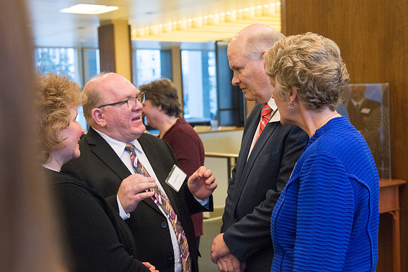 Guests have a chance to mingle during an evening with President Henry J. Eyring in the Church Office Building in Salt Lake City, Utah.