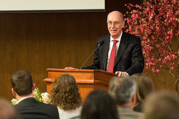 President Henry B. Eyring of the First Presidency speaks to guest.