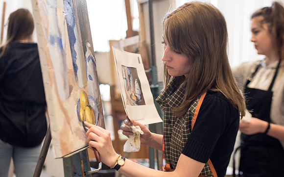 Student, Riley Haycock, at an Oil Painting class taught by Brother Gerald Griffin.