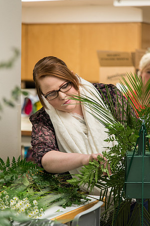 Students at a Bridal Floral Design class taught by Ssiter Cox.