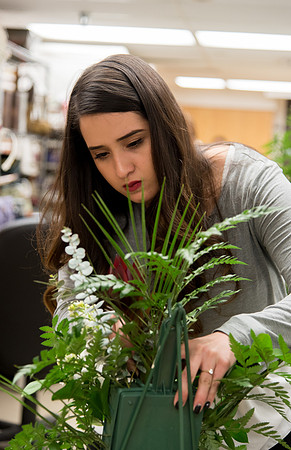Students at a Bridal Floral Design class taught by Ssiter Cox.
