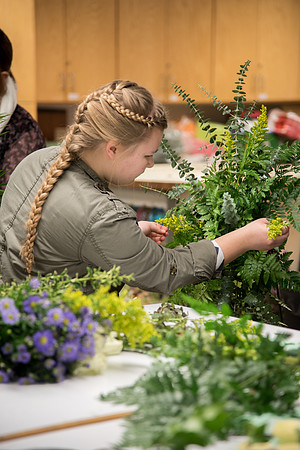 Students at a Bridal Floral Design class taught by Ssiter Cox.