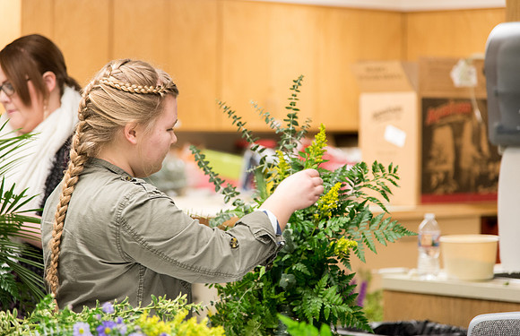 Students at a Bridal Floral Design class taught by Ssiter Cox.