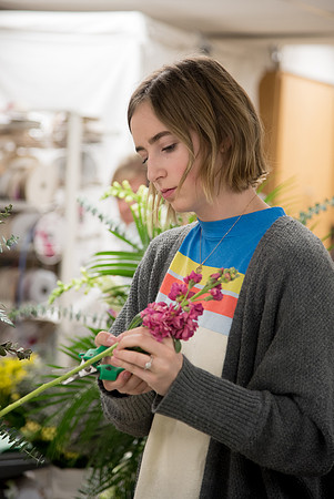 Students at a Bridal Floral Design class taught by Ssiter Cox.