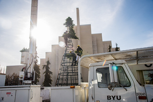 The BYU-Idaho ground keeping crew set up a christmas tree in front of the Taylor chapel. Fall Semester.