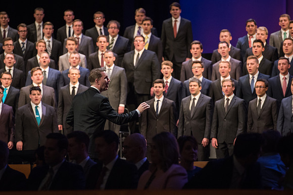 The men's choir performs at Devotional.