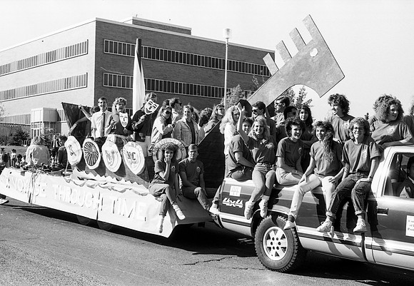 Homecoming parade. R Voyage Through Time float