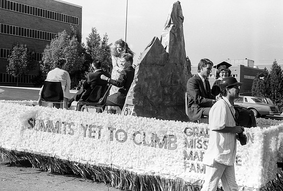 Homecoming parade, Summits yet to climb float.
