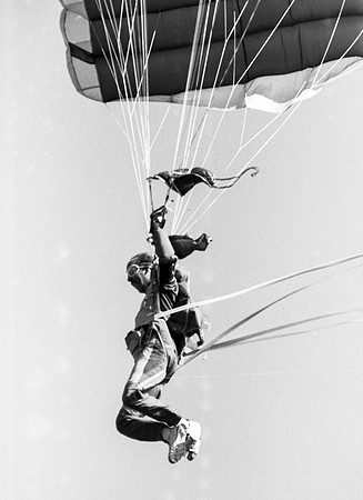 Homecoming football game, parachuter.