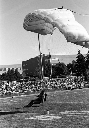 Homecoming football game, parachuter.