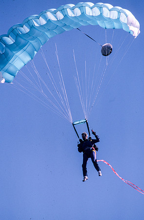 Homecoming football game, parachuter.