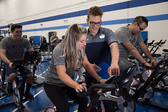 A BYU-Idaho Welness Center student employee coaching other student to achieve their goals towards health and wellness. Feb 2018