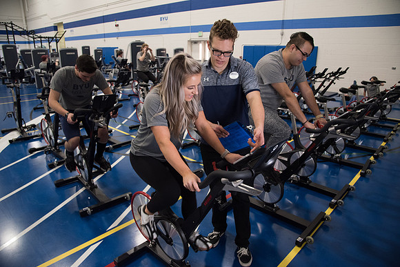 A BYU-Idaho Welness Center student employee coaching other student to achieve their goals towards health and wellness. Feb 2018