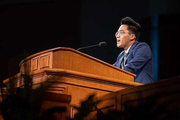 Students and faculty gather in the BYU-Idaho center for the weekly devotional.
