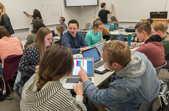 Students in a Biology class taught by John Fisher gather regularly for group study to help one another learn. April 2018