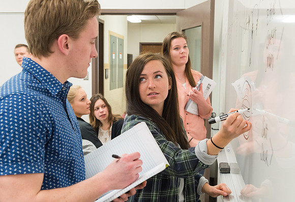 Students in a Biology class taught by John Fisher gather regularly for group study to help one another learn. April 2018