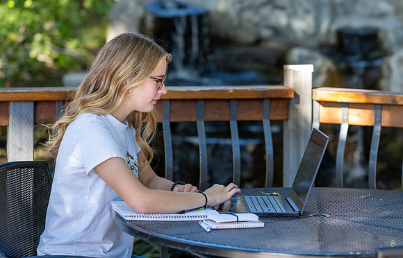 Students enjoy the tranquility of the Ricks Horticulture Gardens.